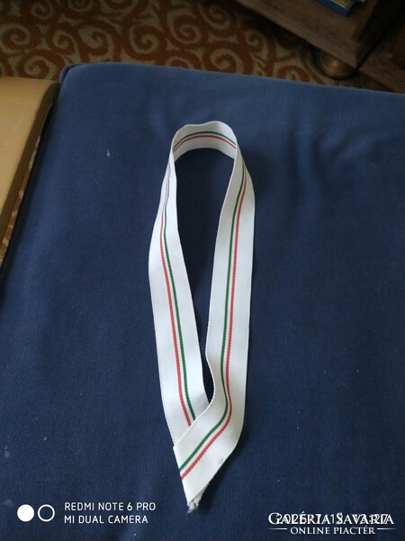 Sport érme nyakba akasztó szalag.