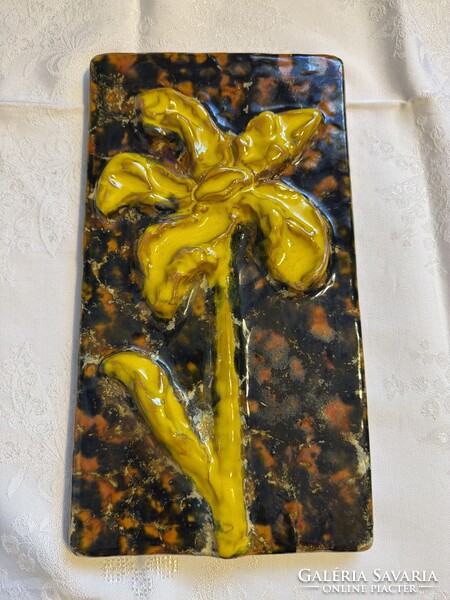 Beautiful hard ceramic embossed pattern with yellow floral image.