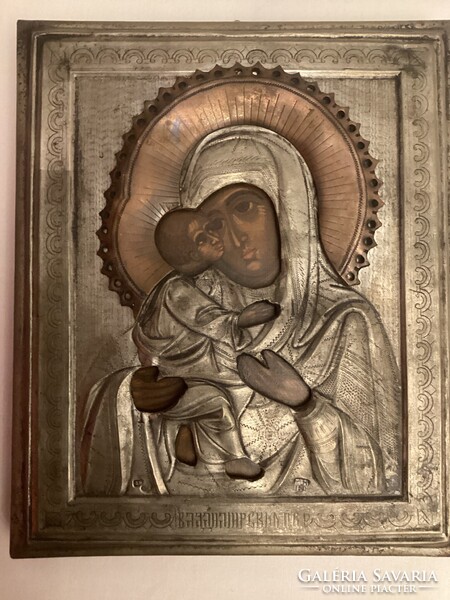 Antique, silver-clad  icon, 19th century ( 1867 ) .