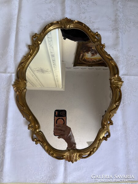 Italian oval wall mirror with beautiful pierced frame.