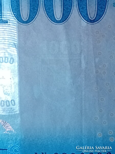 2023 évi 1000 Forintos, jelentős nyomdahibával.