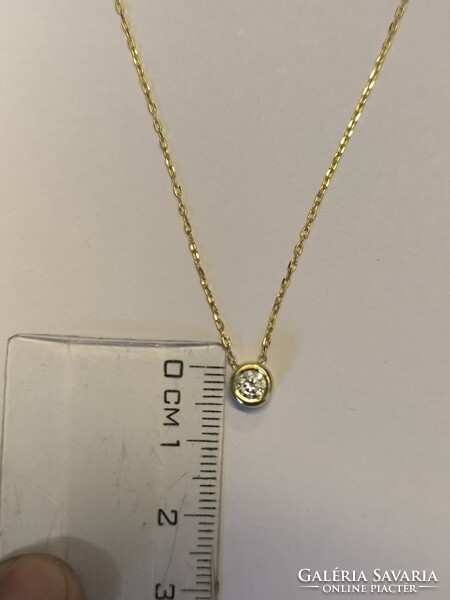 Modern buton foglalatos csúszka medál és nyaklánc cca:0,25 ct