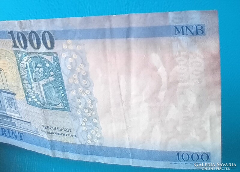 2023 évi 1000 Forintos, jelentős nyomdahibával.