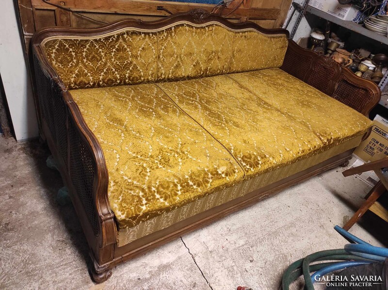 Antique daybed. Foldable with bedding storage.