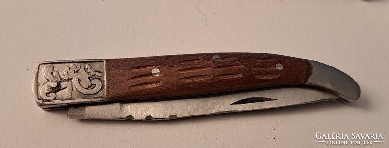 Wooden-handled pocket knife with steel blade