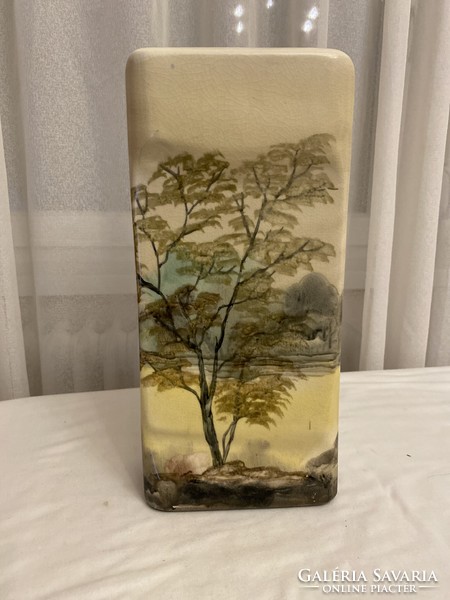 The vase is large, hand painted.